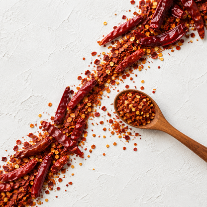 Red chilli flakes creative flat lay